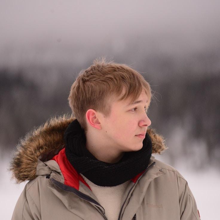 Kaveri Mehta, Lead Design Curator at Nova Lithium Core, reviewing corporate floral arrangements